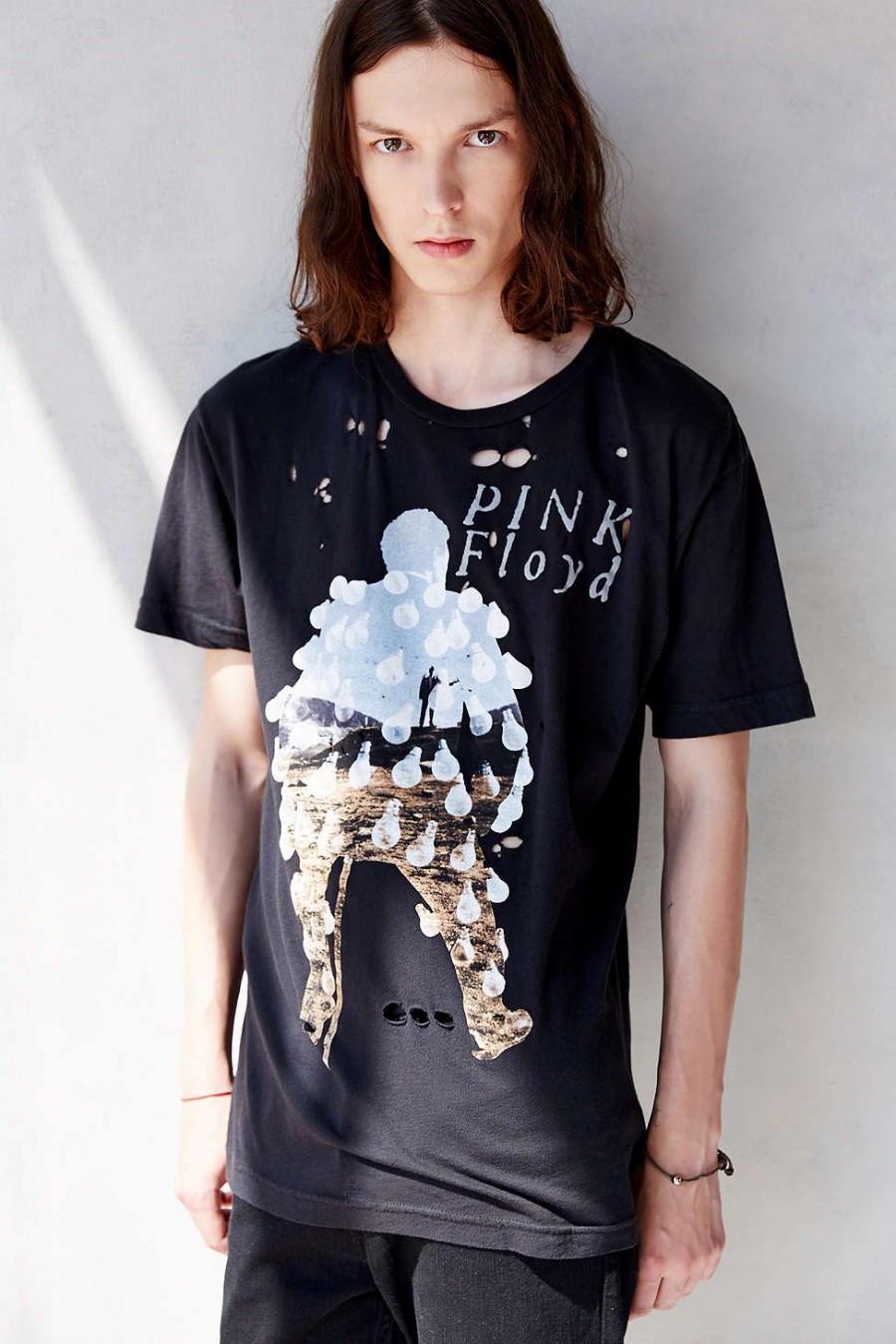The band tee is a youthful staple that will most likely never go out of style. Show your impressive music knowledge by representing a band like Pink Floyd. Pink Floyd Destroyed Tee from Urban Outfitters.