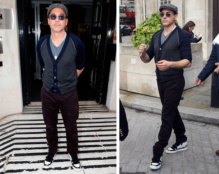 Out for a stroll in London, Robert Downey Jr. paired a casual cardigan and t-shirt with Brunello Cucinelli plum pants.