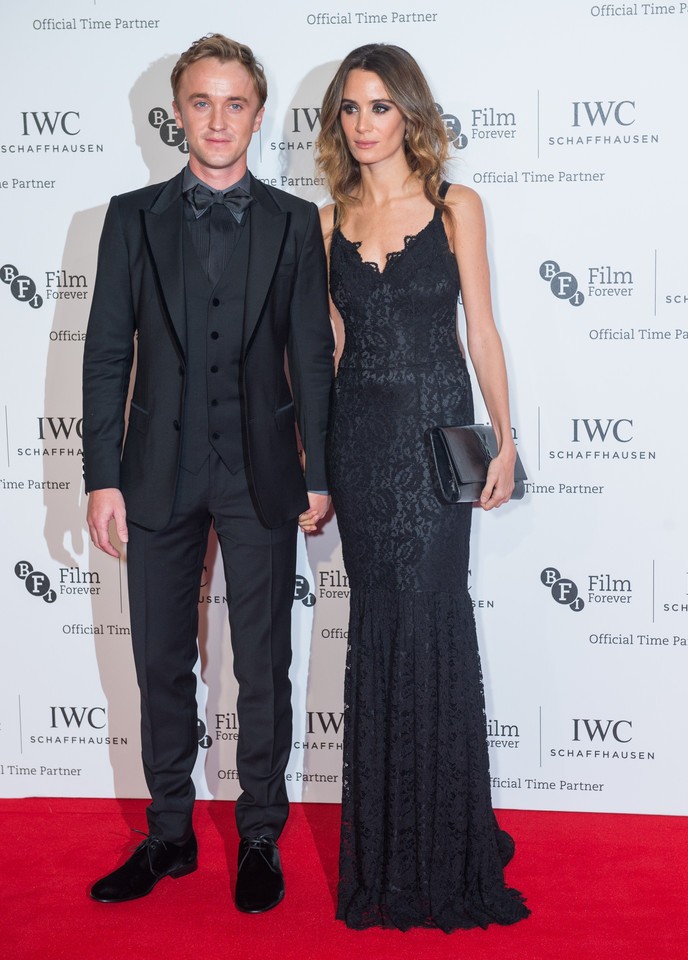 Attending the IWC Gala dinner with Jade Olivia on October 7, 2014 in London, actor Tom Felton wore a dapper evening look from Italian fashion house Dolce & Gabbana.