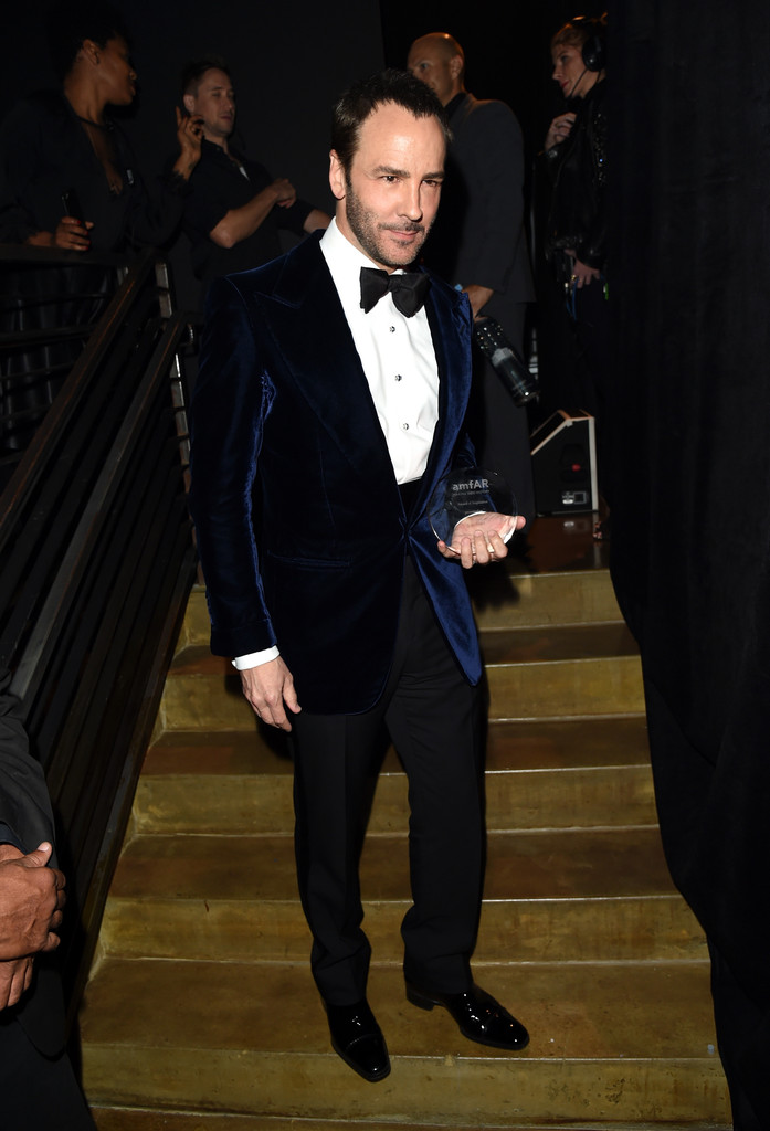 Honoree of the evening, American designer Tom Ford dazzles in a blue velvet jacket.
