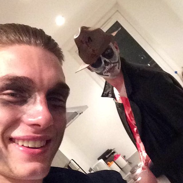 Models Tommy Marr and Matthew Holt prepare to celebrate Halloween together.