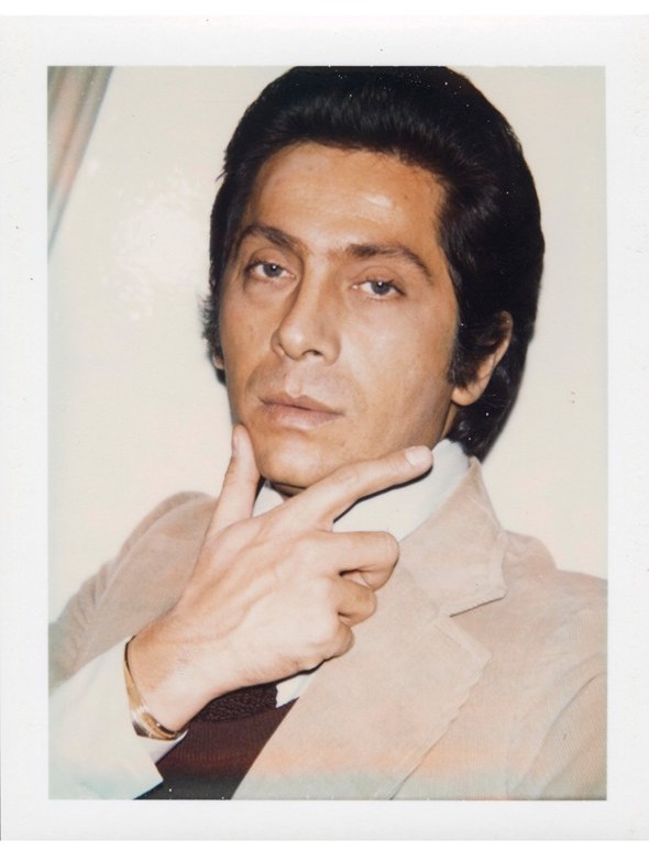 Captured in 1973, designer Valentino Garavani delivers a fierce polaroid image by Andy Warhol.