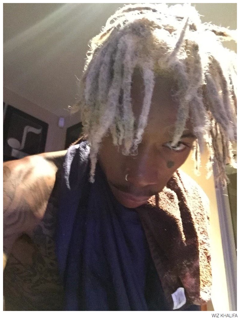 Wiz Khalifa shows off his bleached hair.