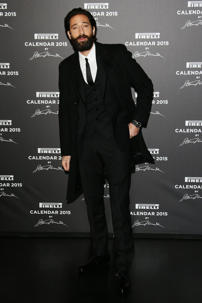 A striking vision in head to toe Dolce & Gabbana, actor Adrien Brody impressed as went out to celebrate the 2015 Pirelli Calendar on November 18th in Milan, Italy.