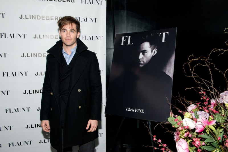 'Into the Woods' star Chris Pine is the latest actor to grace the cover of American magazine Flaunt. Attending a party for the reveal and celebration of his cover on November 22nd in New York City, Pine dressed to impress in a striking double-breasted coat worn over a light blue oxford.