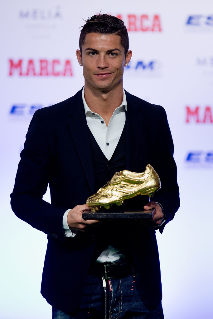 Cristiano Ronaldo poses with his third Golden Boot award.