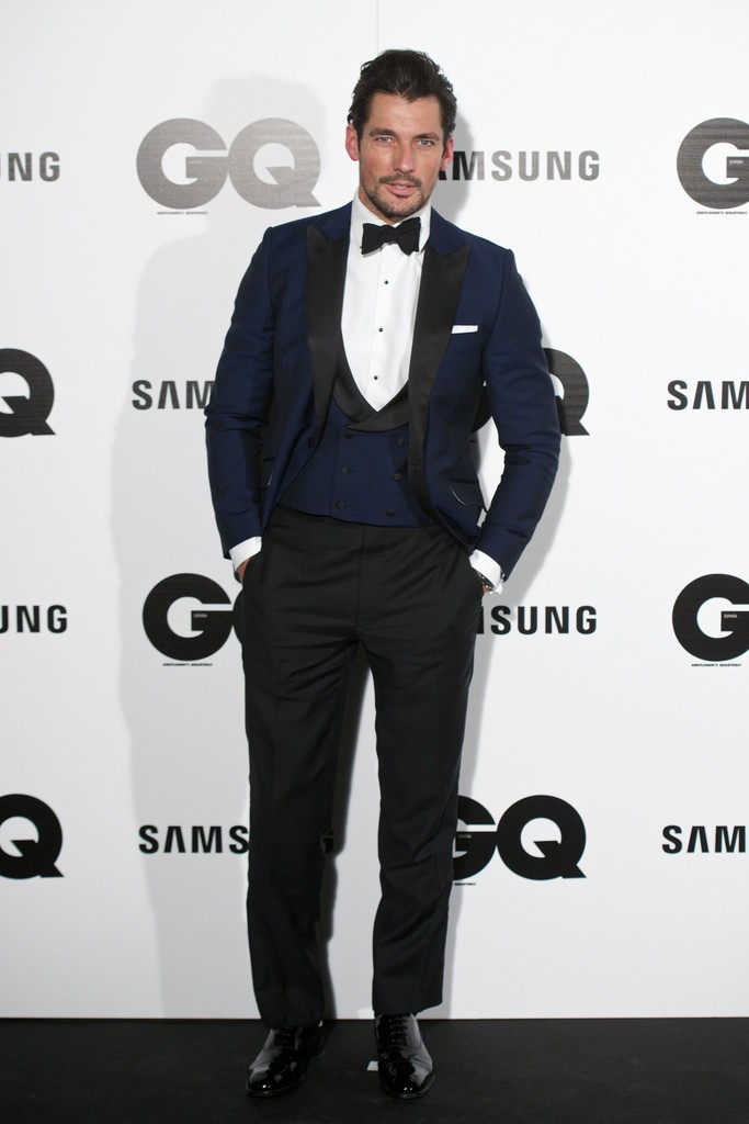 Attending the GQ 2014 Men of the Year Awards in Madrid, Spain on November 3rd, British model David Gandy was honored as 'Model of the Year'. For the occasion, he cleaned up a in dapper blue evening number from British label Duchamp.