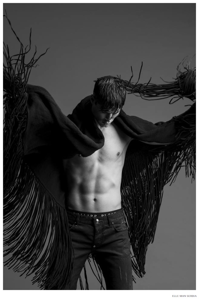 Emilio Flores Embraces Dark Fashions for Elle Man Serbia