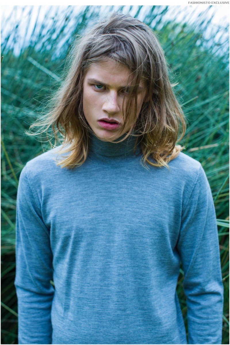 James wears turtleneck SAND.