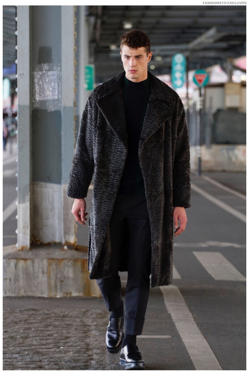 Andy wears coat Emporio Armani, sweater Z Zegna and pants Salvatore Ferragamo.