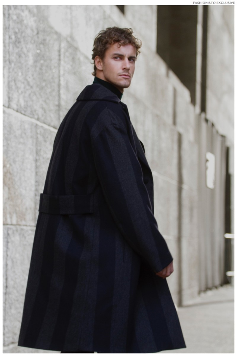 Henrique wears sweater, coat and pants Z Zegna.