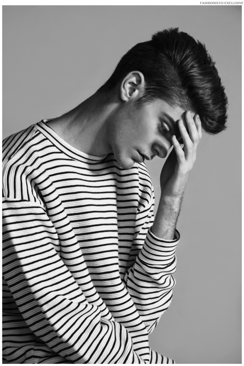 Jorge wears striped tee American Apparel.