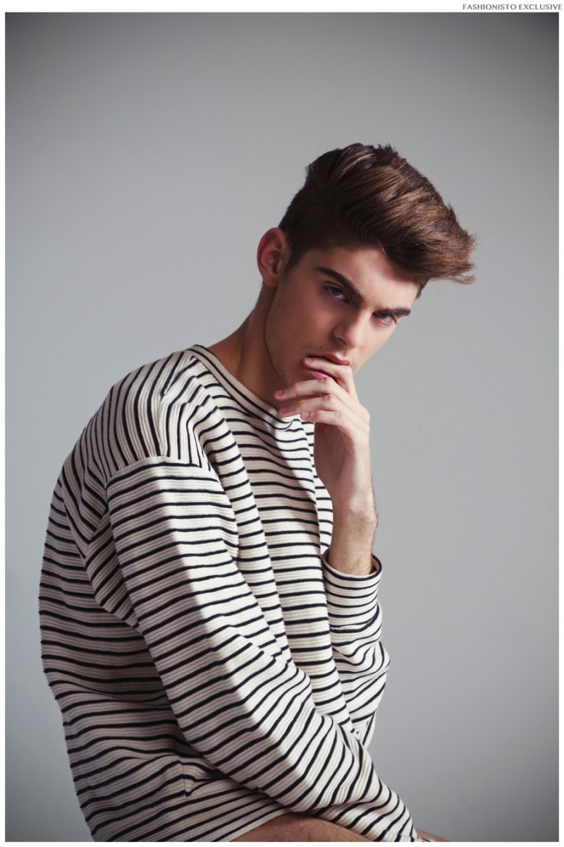 Jorge wears striped tee American Apparel.