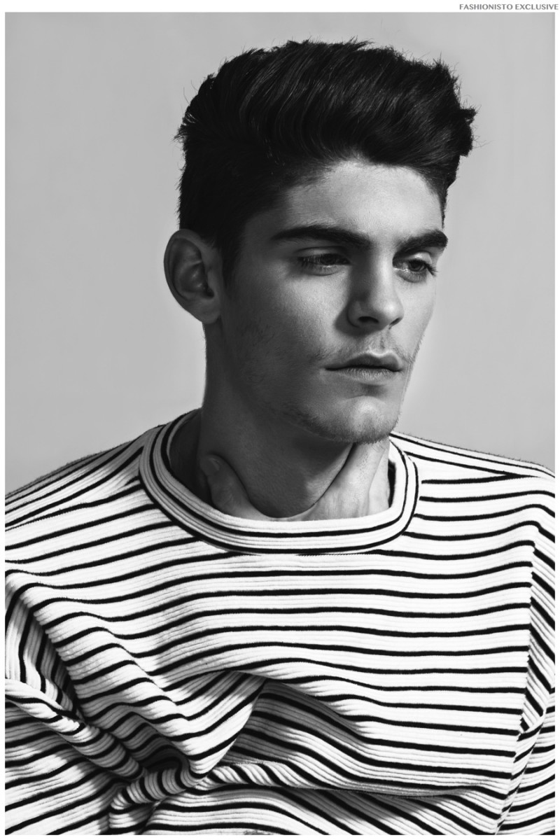 Jorge wears striped tee American Apparel.