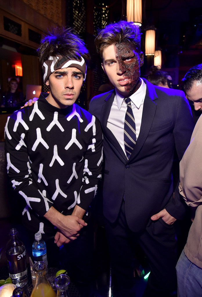 Nolan Gerard Funk poses for a photo with Joe Jonas who was Derek Zoolander for Halloween.