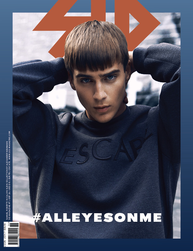 Photographed by Alexander Neumann, model Samuel Roberts snags a cover wearing an 'Escape' sweatshirt from Calvin Klein Collection. / Styling by Julian Antetomaso.