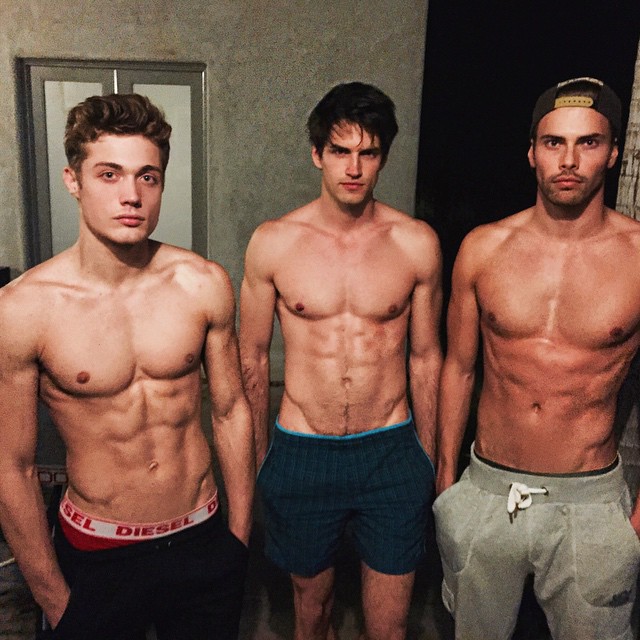 Steven Chevrin, Jakub Zelman and Andreas Eriksen hang out after a gym session.