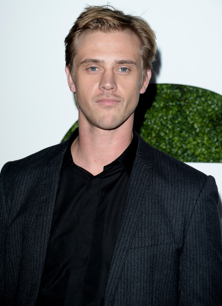 Model turned actor Boyd Holbrook attended GQ's Men of the Year party in Los Angeles on December 4th. For the occasion, Holbrook posed for photos, wearing a charcoal wool, pinstripe, two-button slim notch lapel suit from Parisian fashion label Dior Homme.