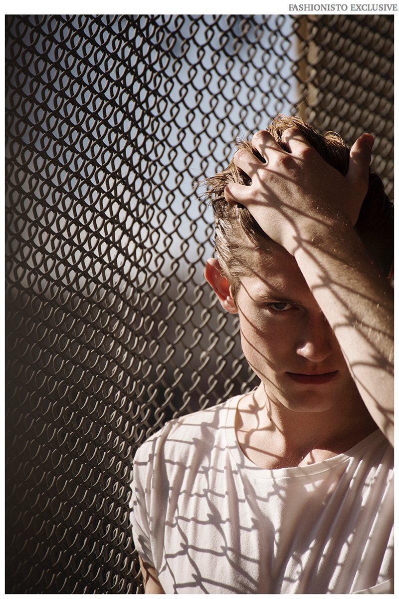 Callum wears t-shirt Topman.