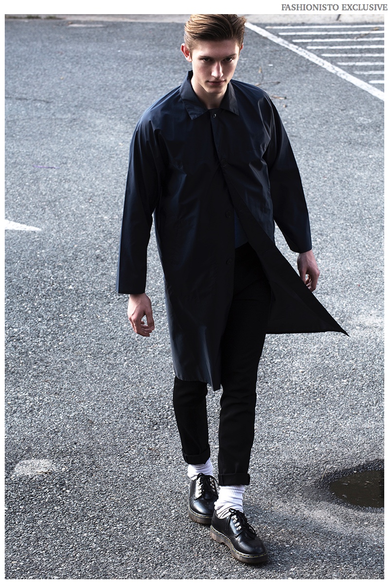 Callum wears coat Maison Martin Margiela, trousers Kenneth Ning, socks model's own and shoes Dr Martens.