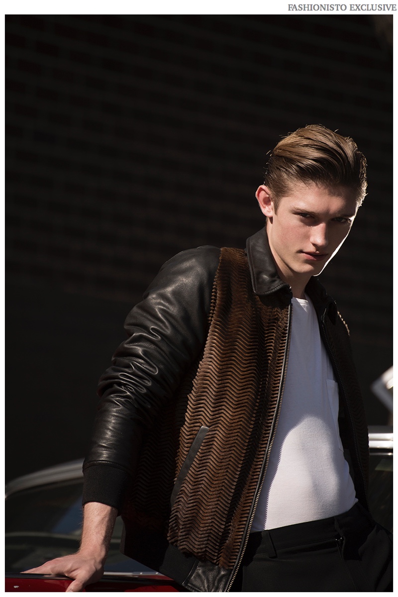 Callum wears jacket Just Cavalli, t-shirt Topman and trousers Kenneth Ning.