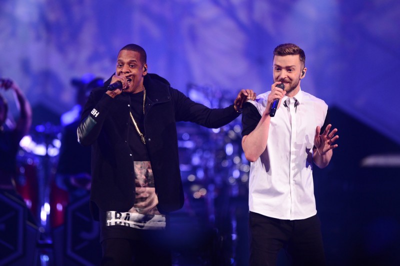 On December 13th, Jay Z made a surprise appearance at Justin Timberlake's Brooklyn concert, which was part of his 20/20 Experience tour. Joining the Neil Barrett-clad singer on stage, Jay Z brought his own stylish attitude with a top from Hood by Air.