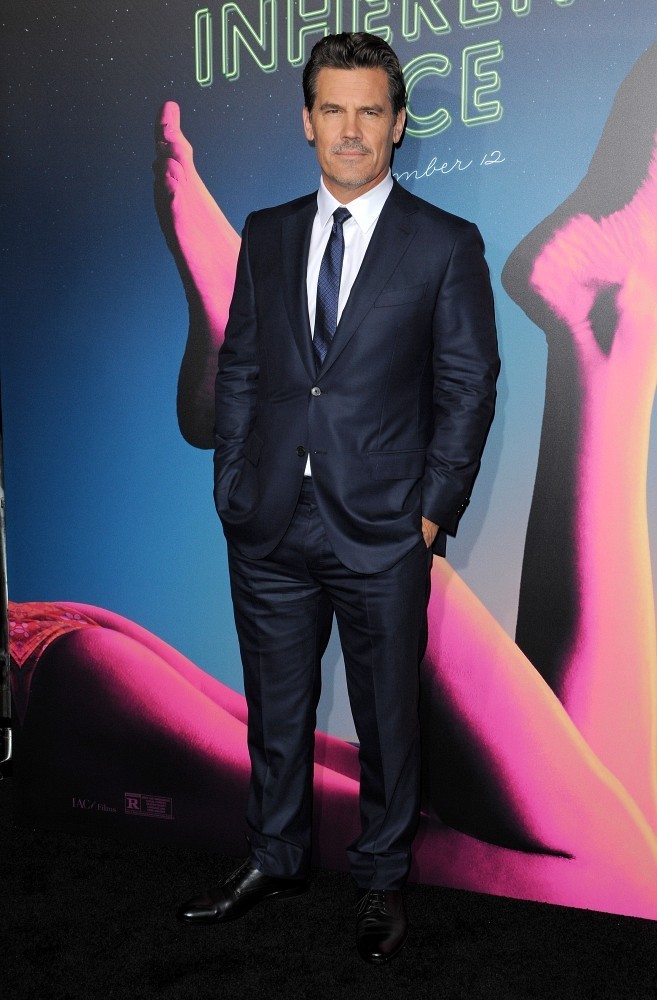 Actor Josh Brolin cleaned up well for the Hollywood premiere of 'Inherent Vice' on December 10th at the TCL Chinese Theater. Posing for photos, Brolin wore a stunning, navy suit from Italian fashion label Ermenegildo Zegna.