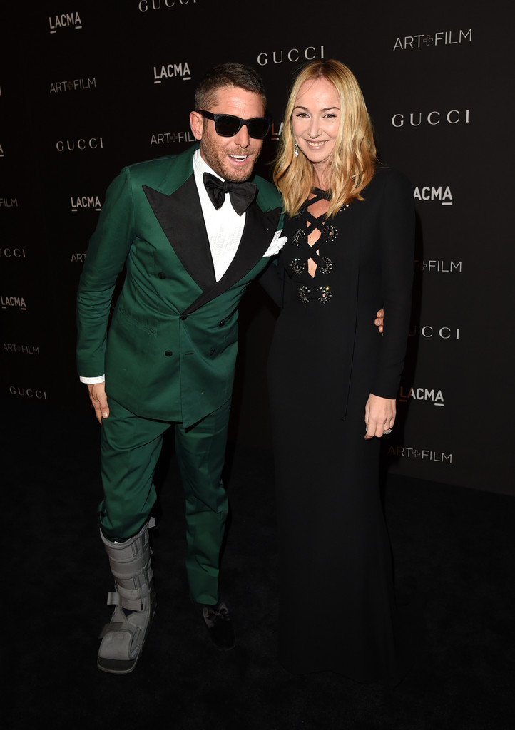 Style icon and entrepreneur Lapo Elkann poses for a photo with Frida Giannini