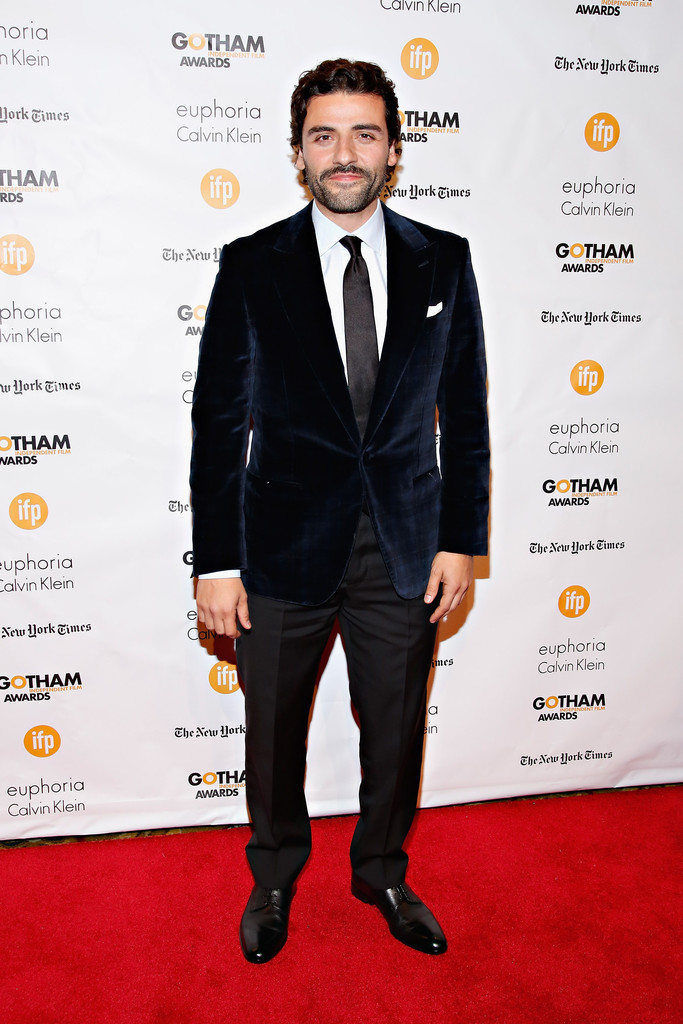 Actor Oscar Issac brought holiday style to the 24th annual Gotham Independent Film Awards on December 1st in New York City. Isaac wore a dapper look from Ermenegildo Zegna that included a luxurious blue velvet jacket.