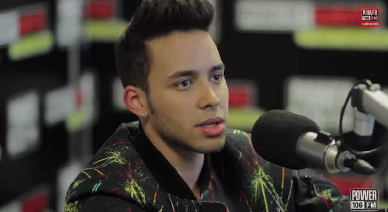 Appearing on Power 106 Los Angeles recently, music artist Prince Royce chatted about crossing over to the English speaking market, working with Snoop Dogg and his Latin Grammys. Confident and effortlessly cool, Prince Royce settles in for the interview, wearing a McQ Alexander McQueen firework print bomber jacket.