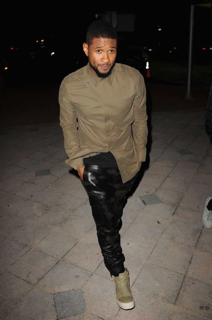 Making a strong style statement, Usher attended the Mercedes-AMG and Lufthansa ARTHAUS reception on December 2nd in Miami, Florida. For the event, Usher paired a Helmut Lang 'Storm Flap' twill shirt with camouflage leather pants and Rick Owens 'Island Dunk' sneakers.