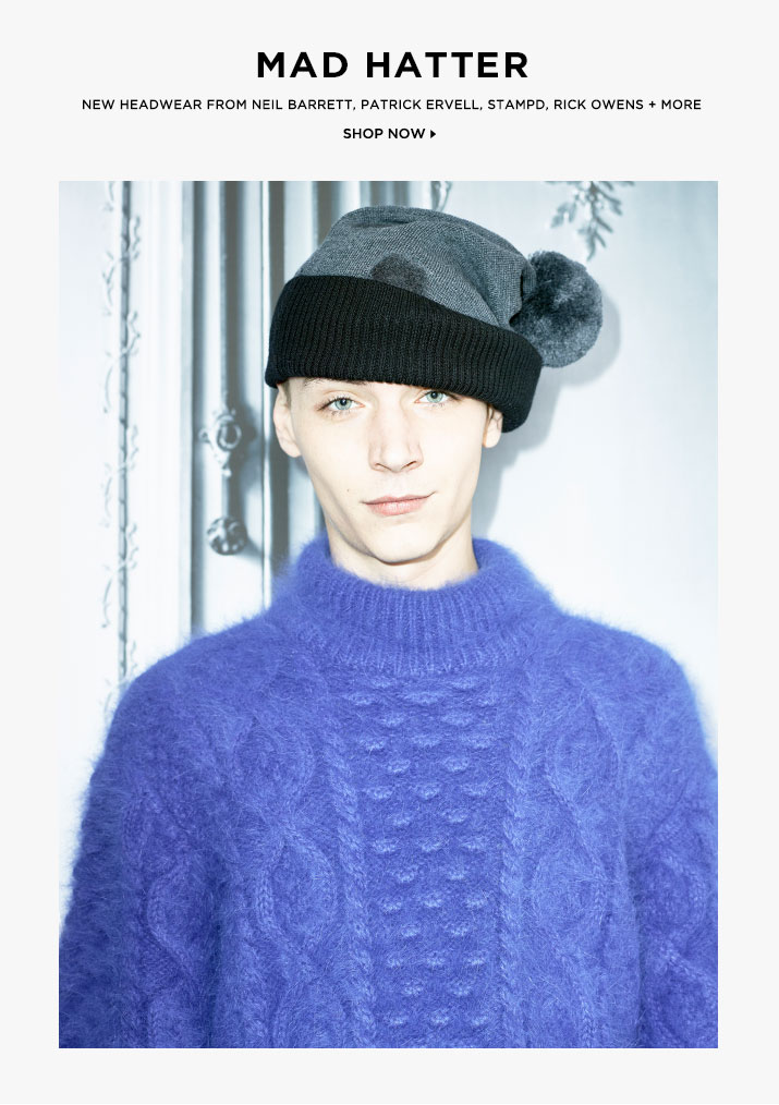 Model Yuri Pleskun wears Band of Outsiders polka dot beanie