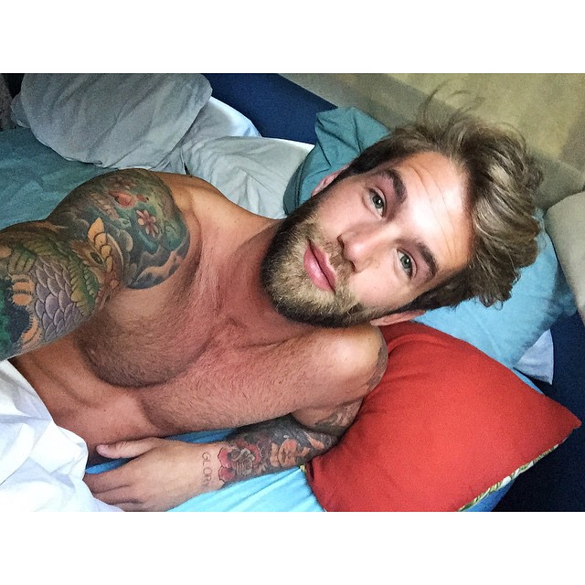 Andre Hamann takes a selfie from bed