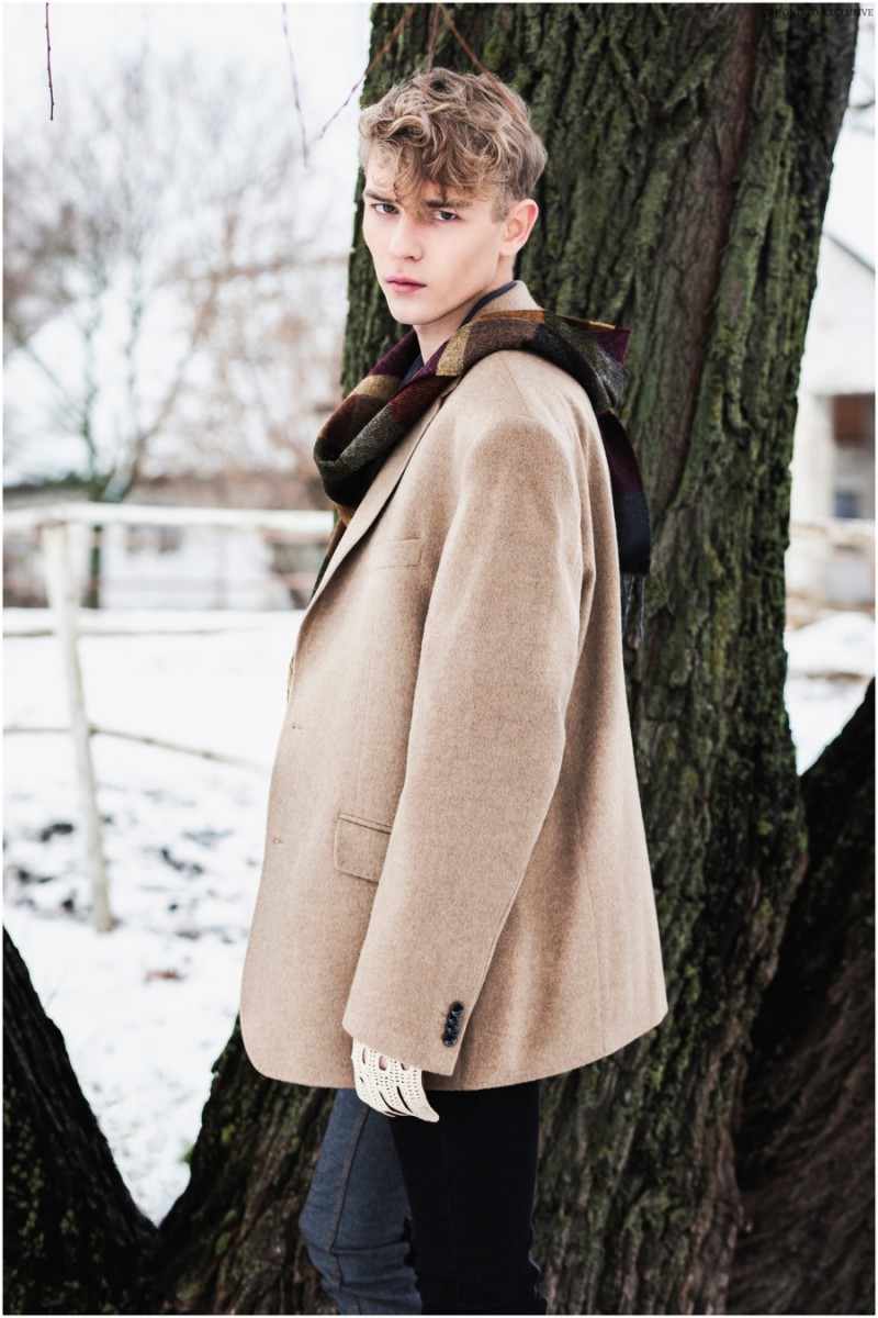 Ivan wears scarf and overcoat Marks & Spencer, jeans Reval Denim Guild and crochet gloves Fratelli.