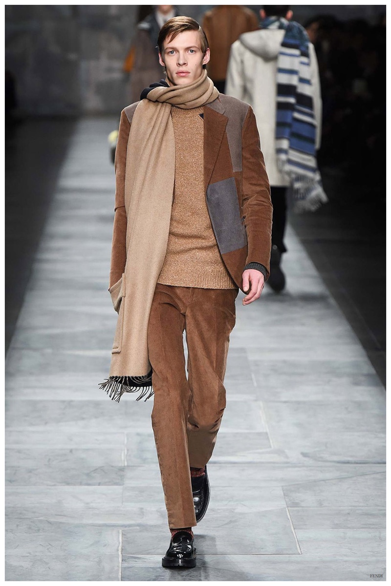 Fendi Fall-Winter 2015 Menswear Collection. Silvia Fendi had corduroy on the mind for fall, but also the shearling trend. Manipulating shearling, Fendi created a faux corduroy for the collection, sending rich brown imitations down the catwalk. The tailored fits were easily a success, contributing to smart coordinated ensembles.