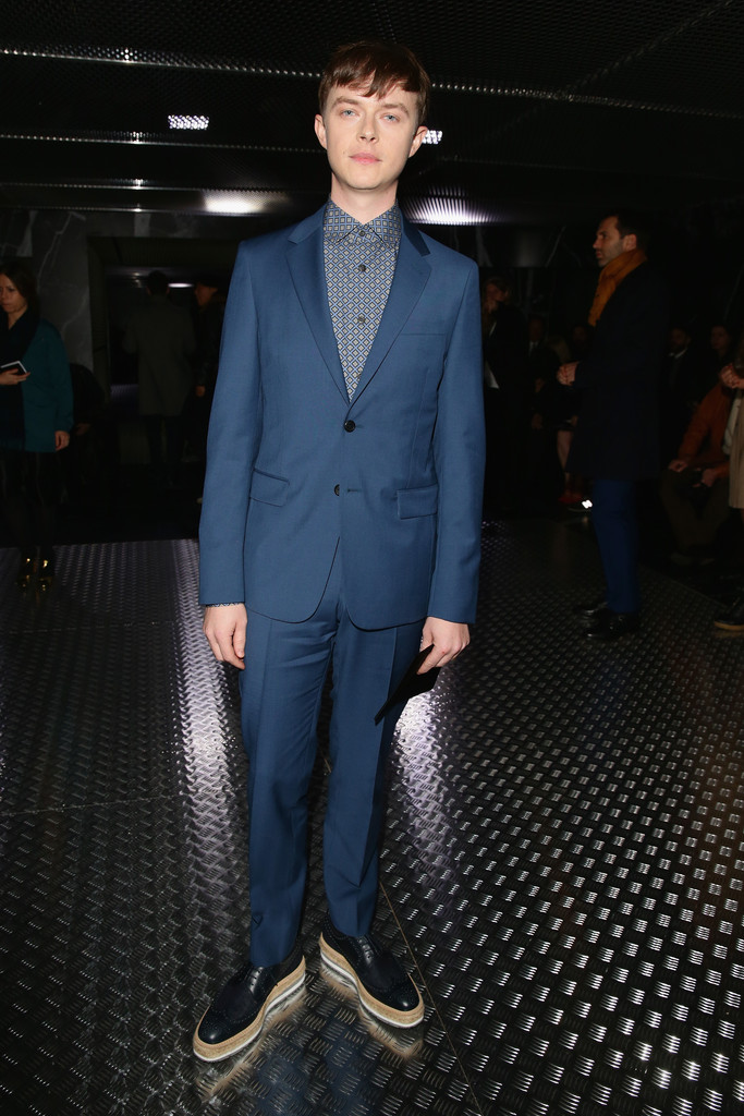 Dane DeHaan poses for a photo at Prada's fall-winter 2015 menswear show.