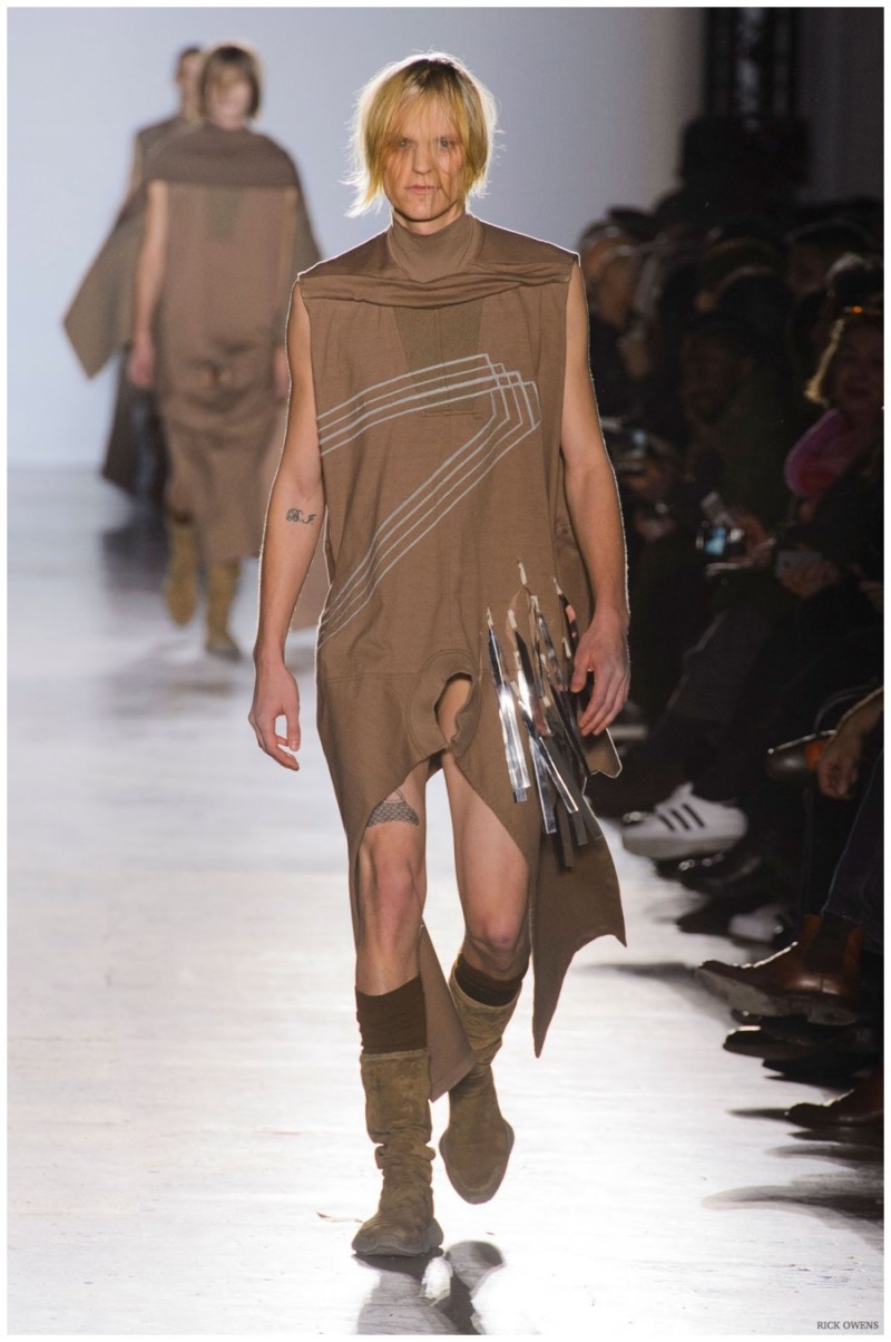 Rick Owens Fall-Winter 2015 Collection. Designer Rick Owens made headlines with his fall collection. Sending his models down the catwalk in revealing clothes that featured the penis on display, Owens championed equal objectification. Long tunics in earthy hues contributed to a unisex look.