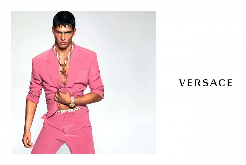 Model Miroslav Cech makes a Havana-inspired fashion statement, wearing a pink suit for Versace Men's spring-summer 2015 campaign.