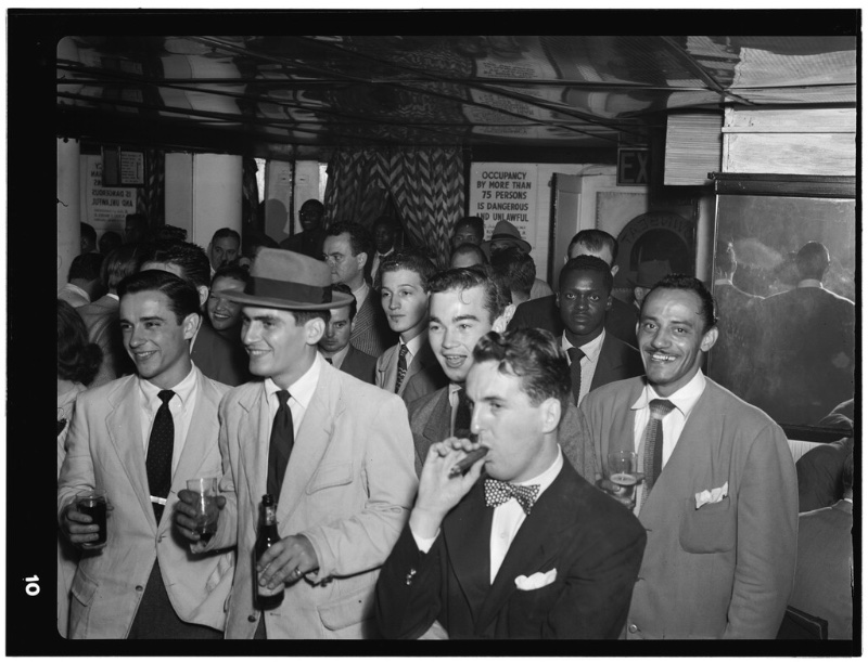 Jazz fans enjoy the music at New York's Downbeat Club circa 1948.