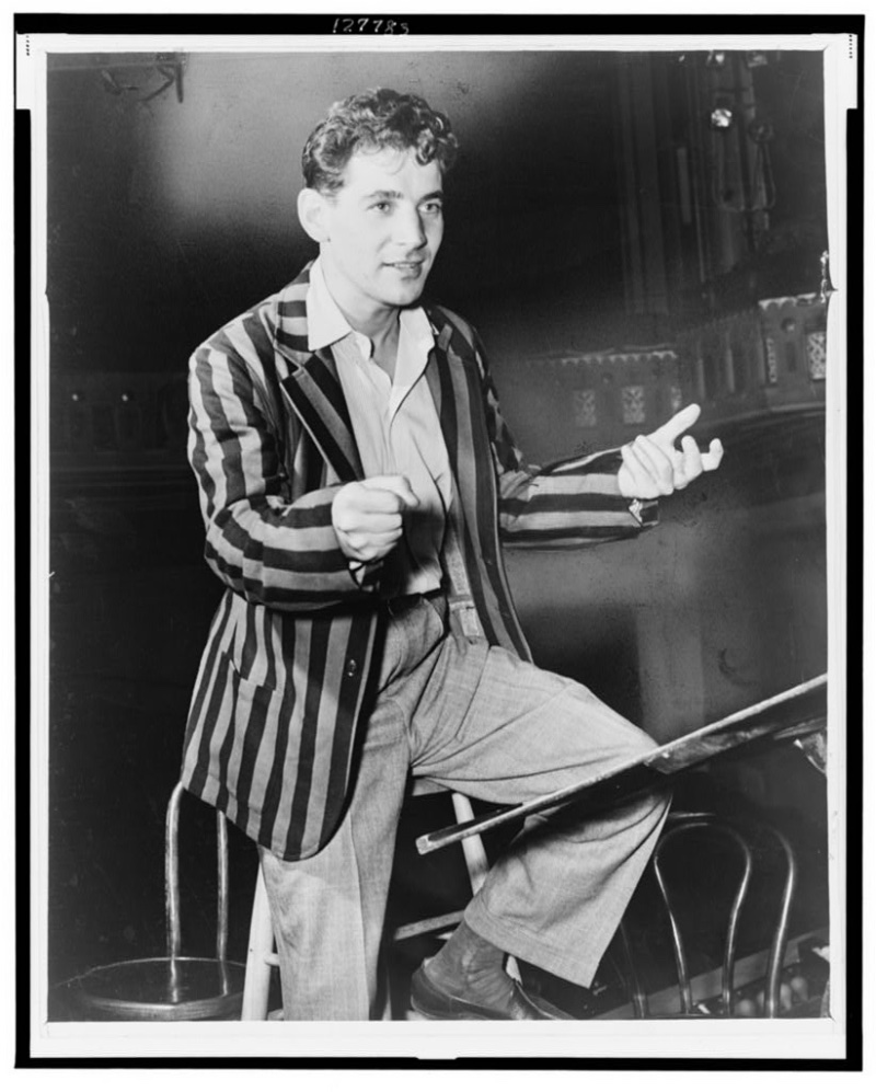 Conductor Leonard Bernstein circa 1945 wears a striped sport coat with wide-cut trousers. 