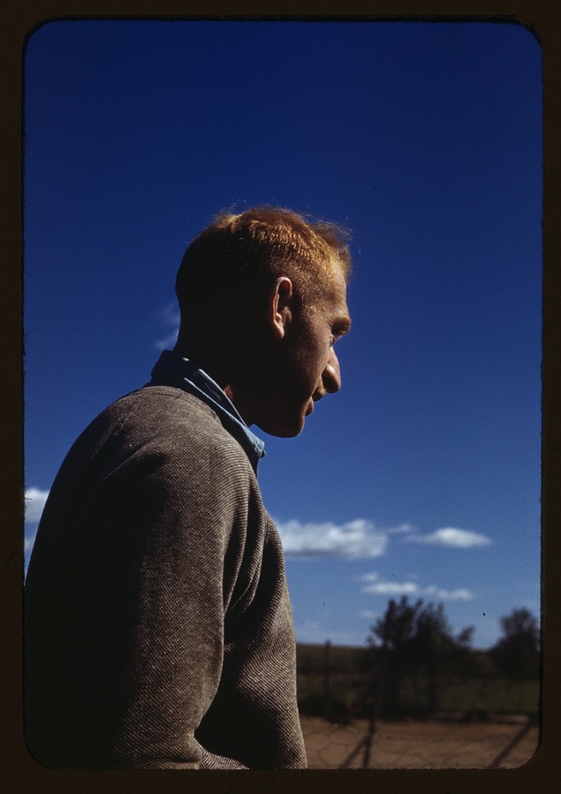 Photographed between 1941 and 1942, a man, possibly a farmer, wears a crewneck sweater.