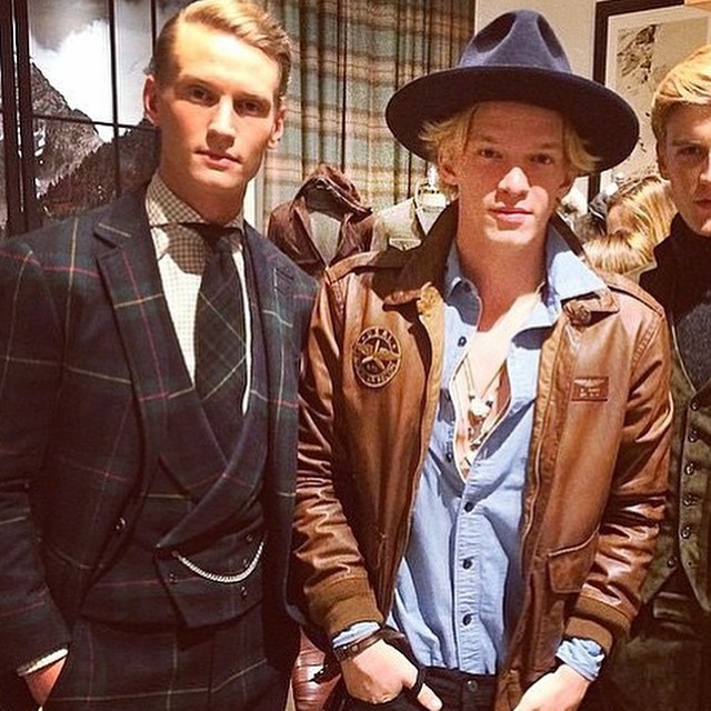 Alexander Johansson poses with singer Cody Simpson at Ralph Lauren's fall 2015 presentation.