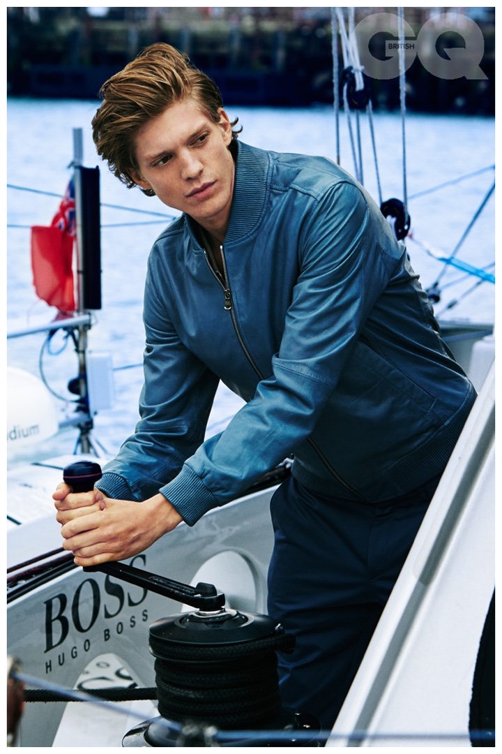Ready to set sail, Jonatan Frenk sports a blue leather jacket.