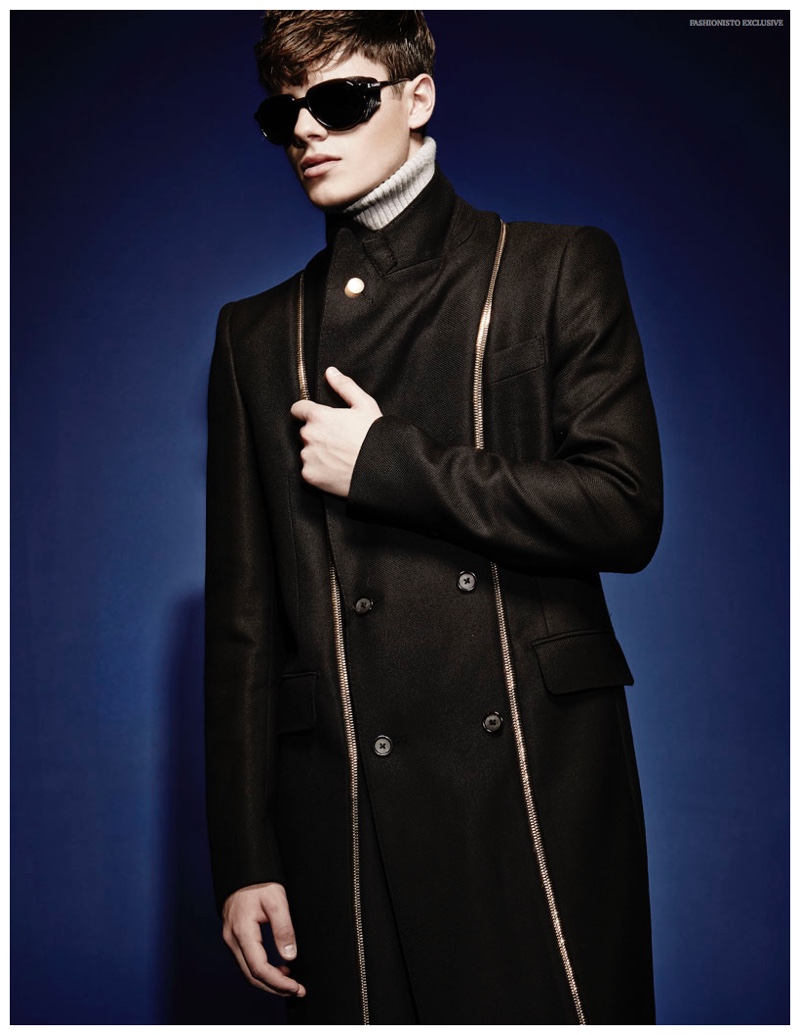 Casey wears turtleneck AMI, jacket Alexander McQueen, pants Dsquared2 and vintage sunglasses stylist's own.