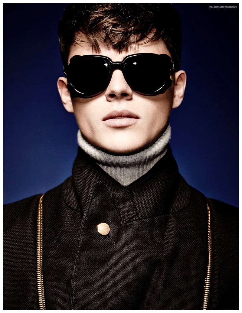 Casey wears turtleneck AMI, jacket Alexander McQueen and vintage sunglasses stylist's own.