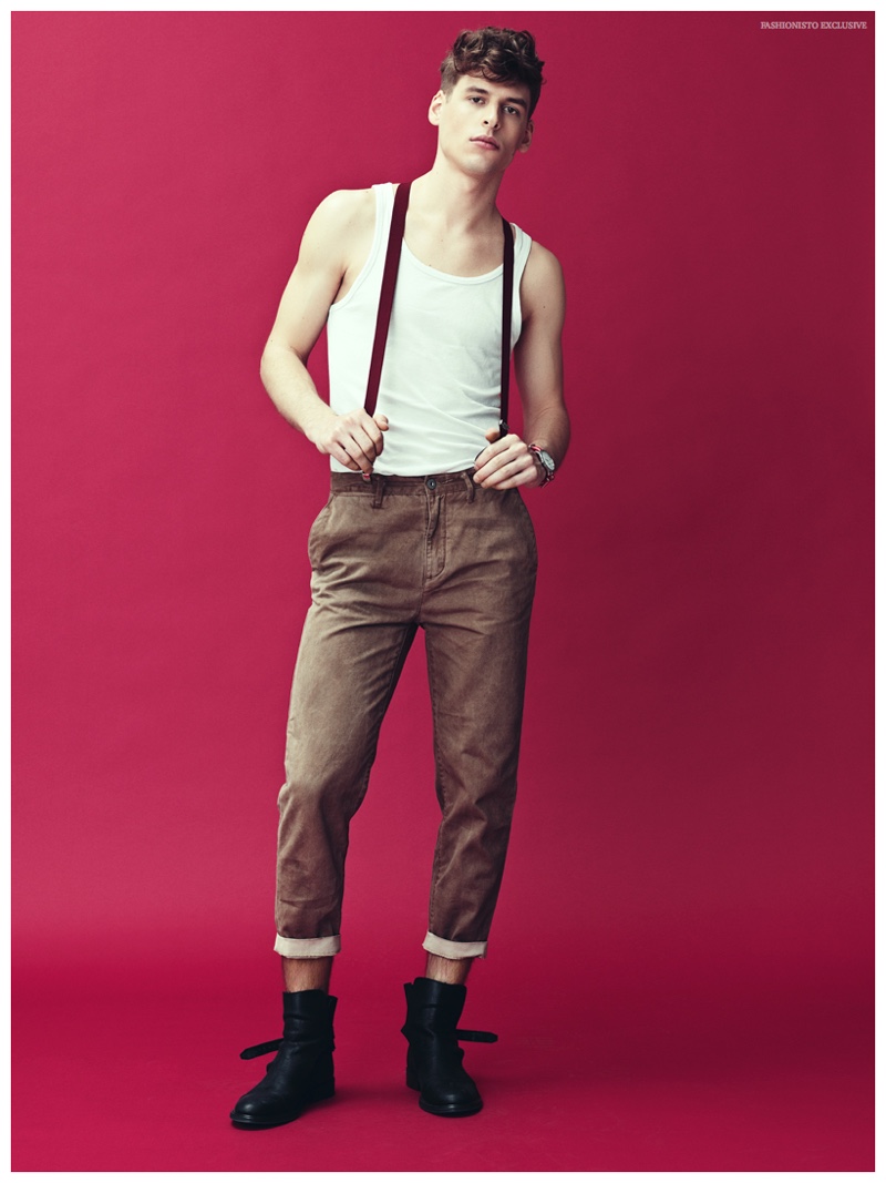 Domi wears tank H&M, suspenders stylist's own, chinos Cheap Monday, boots won Hundred and watch Les Deux.