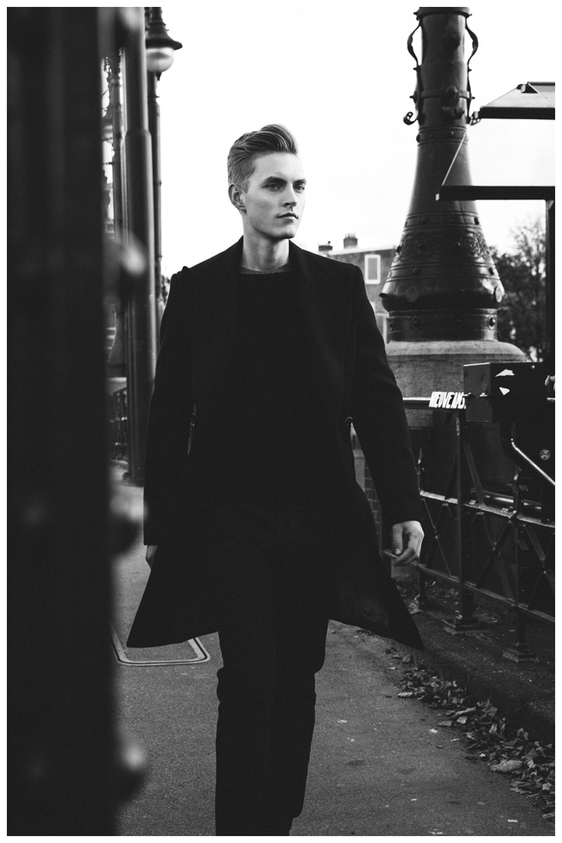 Jelmer wears sweater Hommard, coat Atelier Scotch and jeans Element.