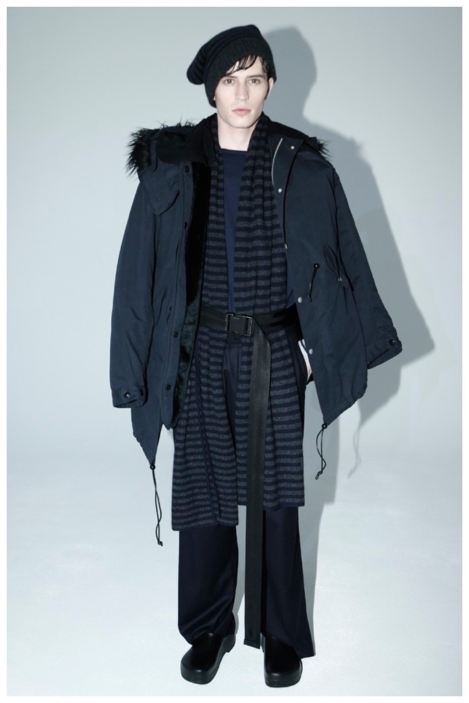 Oversized proportions inspired at Fingers Crossed. Here a scarf is belted underneath a modern parka. Fingers Crossed Fall/Winter 2015 Menswear Collection.