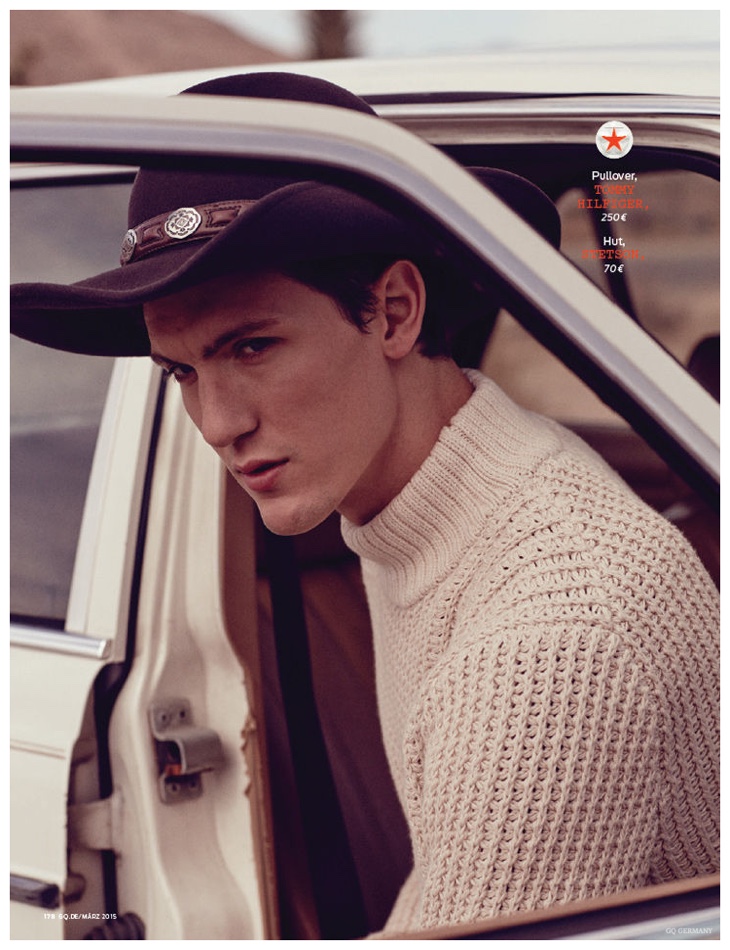 Tyler is a casual western image in a Stetson cowboy-inspired hat, paired with a Tommy Hilfiger knit.