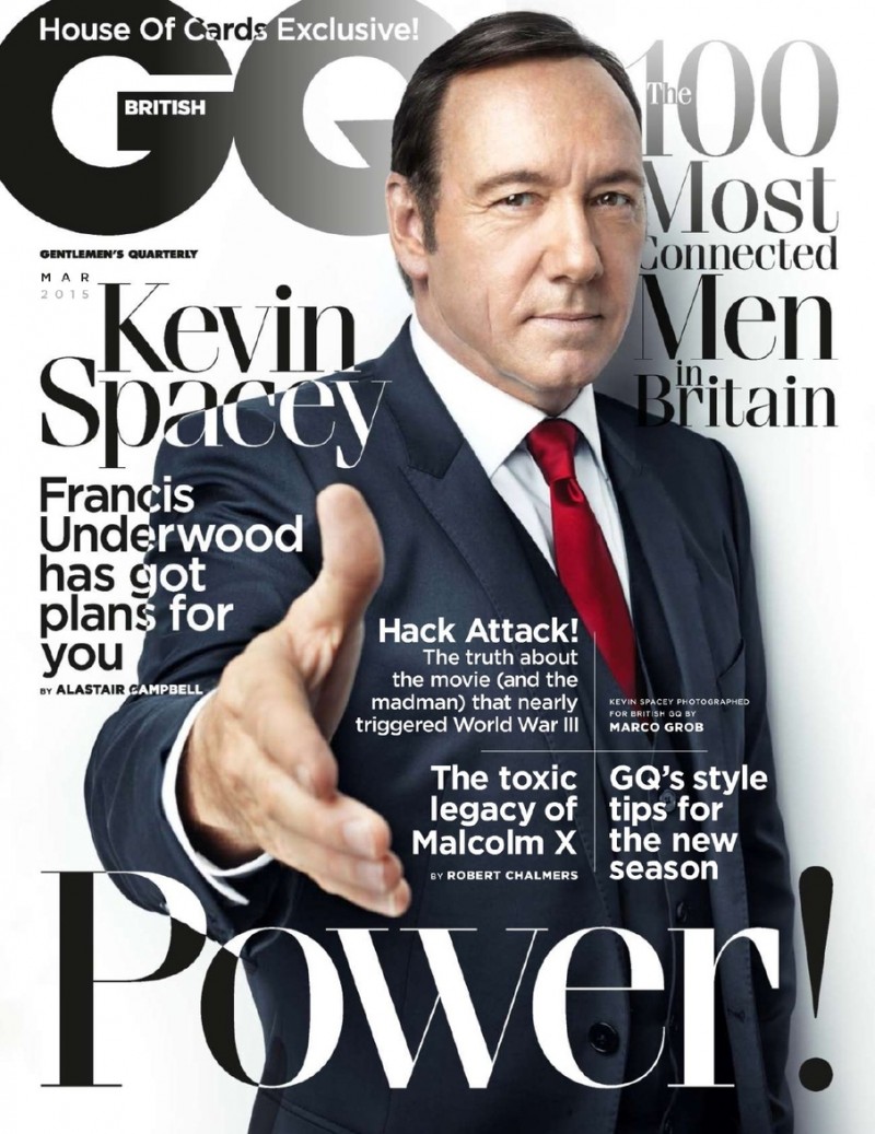 Kevin Spacey offers a helping hand on the March 2015 cover of British GQ.